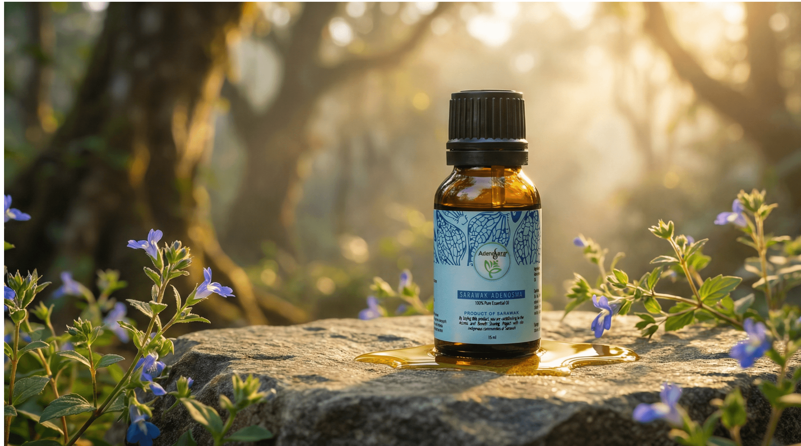 AdenoSara essential oil bottle on stone — exclusive to Sarawak