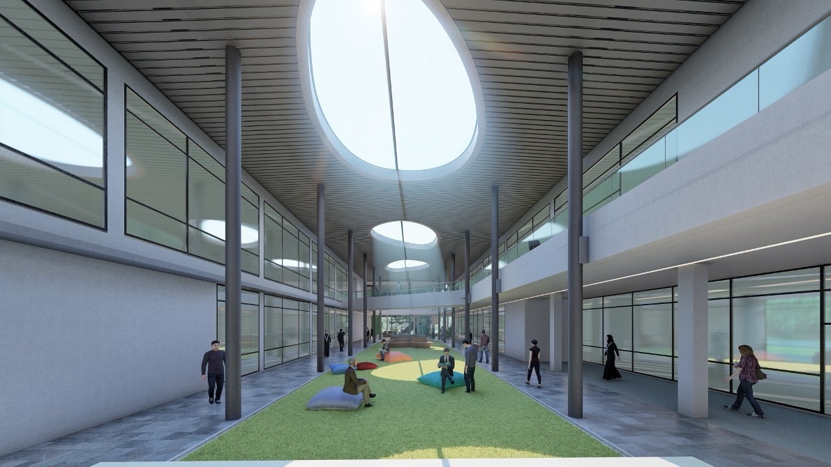 Artist's impression — skylit commons area with circular skylights and green gathering space